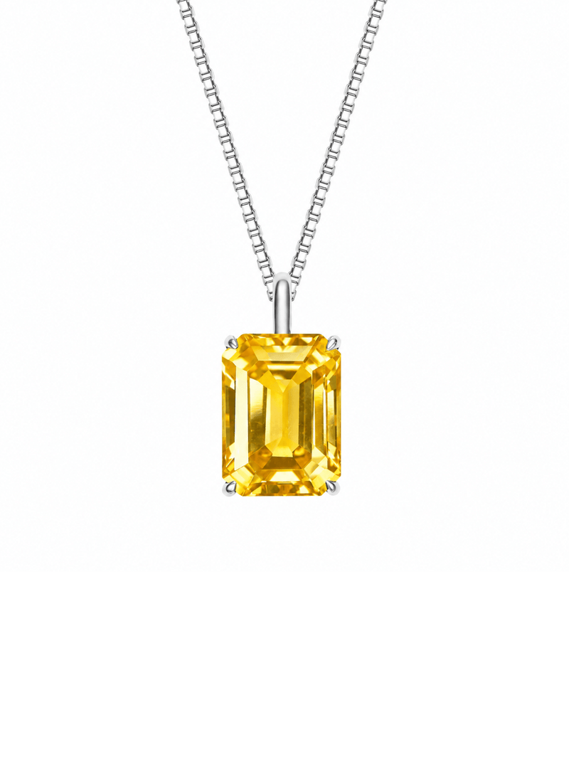 Sapphire emerald-cut necklace with hand-set setting detail view showcasing the jewelry design and finish