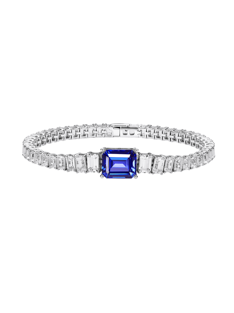 Padparadscha emerald-cut tennis bracelet with hand-set setting detail view showcasing the jewelry design and finish