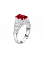 Royal blue sapphire emerald-cut ring with hand-set setting detail view showcasing the jewelry design and finish