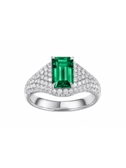 Padparadscha emerald-cut ring with hand-set setting detail view showcasing the jewelry design and finish