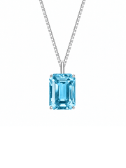 Sapphire emerald-cut necklace with hand-set setting detail view showcasing the jewelry design and finish