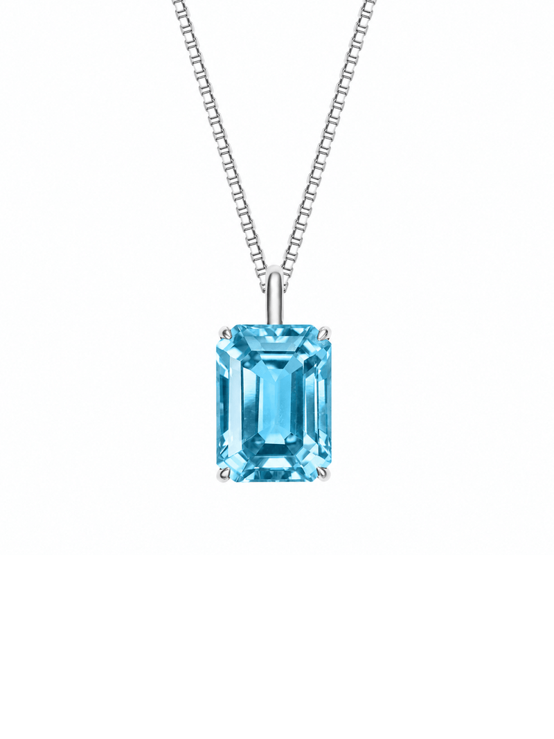 Sapphire emerald-cut necklace with hand-set setting detail view showcasing the jewelry design and finish