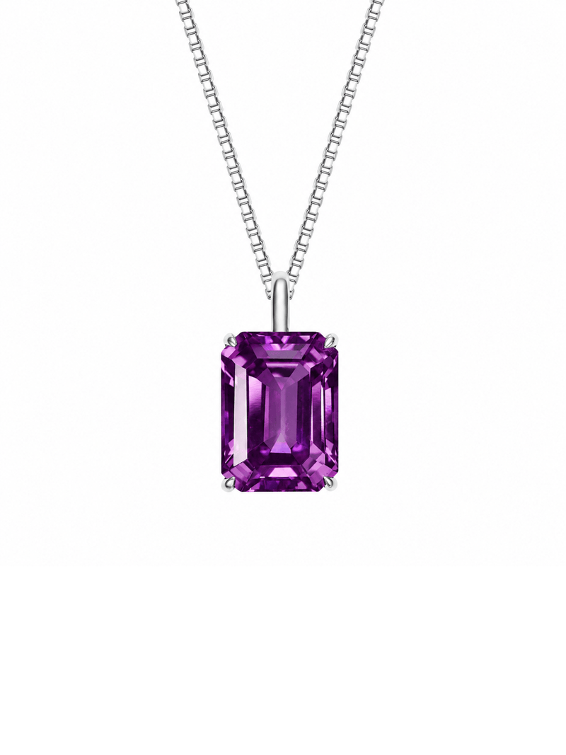 Hot pink sapphire emerald-cut necklace with hand-set setting angled view showing the silhouette and craftsmanship