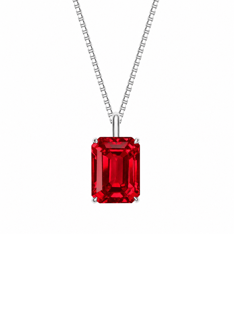 Hot pink sapphire emerald-cut necklace with hand-set setting detail view showcasing the jewelry design and finish