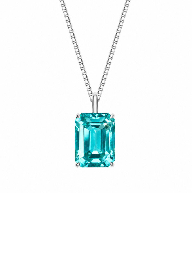 Hot pink sapphire emerald-cut necklace with hand-set setting angled view showing the silhouette and craftsmanship