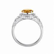 Padparadscha oval-cut ring with hand-set setting angled view showing the silhouette and craftsmanship