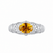 Sapphire oval-cut ring with hand-set setting close-up view highlighting the gemstone cut and setting details