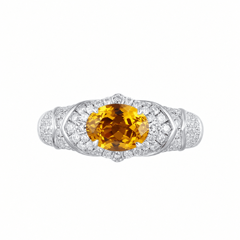Sapphire oval-cut ring with hand-set setting close-up view highlighting the gemstone cut and setting details