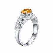 Ruby oval-cut ring with hand-set setting angled view showing the silhouette and craftsmanship