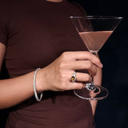 AUREL yellow east-west oval gemstone ring styled with a brown top and cocktail glass