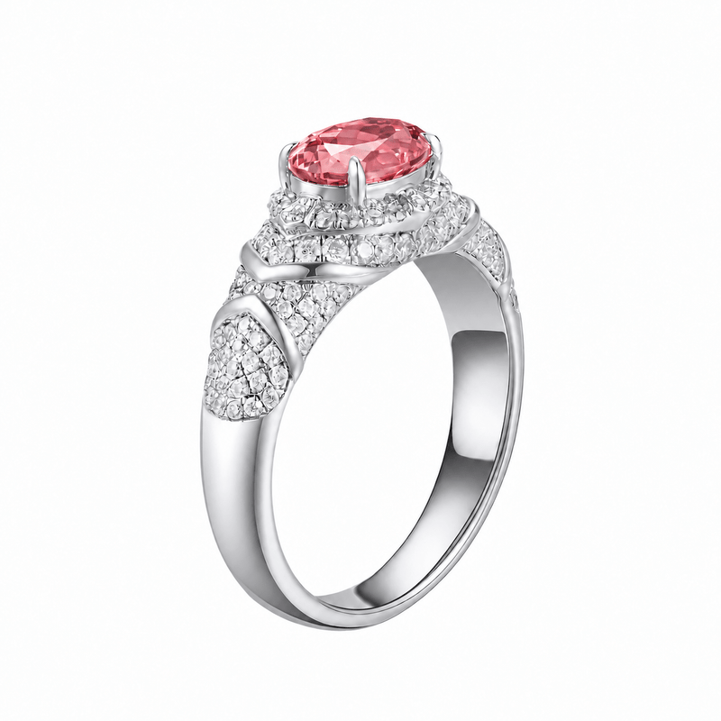 Hot pink sapphire oval-cut ring with hand-set setting detail view showcasing the jewelry design and finish