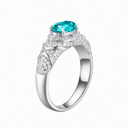 Canary yellow sapphire oval-cut ring with hand-set setting detail view showcasing the jewelry design and finish