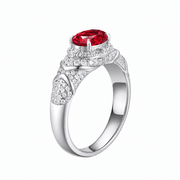 Yellow oval-cut ring with hand-set setting detail view showcasing the jewelry design and finish