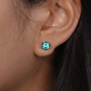 CIRA blue-green round gemstone stud earring shown on the ear