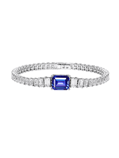 Padparadscha emerald-cut tennis bracelet with hand-set setting detail view showcasing the jewelry design and finish