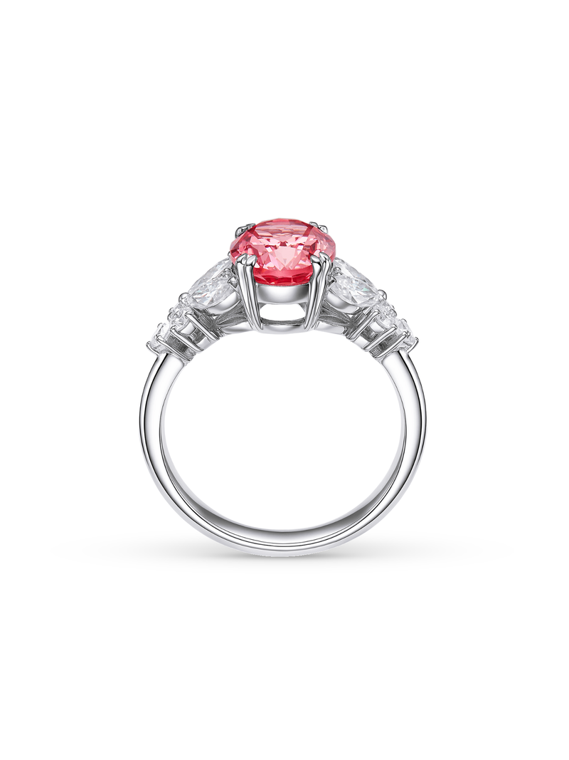 Canary yellow sapphire oval-cut ring with hand-set setting angled view showing the silhouette and craftsmanship