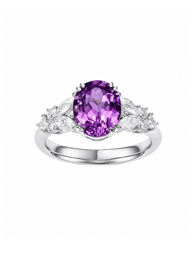 Hot pink sapphire oval-cut ring with hand-set setting detail view showcasing the jewelry design and finish