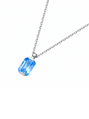 Ruby radiant-cut necklace with hand-set setting detail view showcasing the jewelry design and finish
