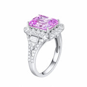 REINE pink gemstone halo ring angled view showing pav¨¦ shoulders and the open setting