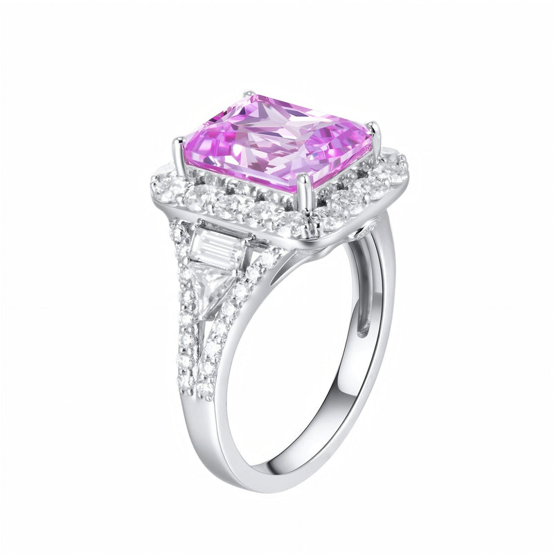REINE pink gemstone halo ring angled view showing pav¨¦ shoulders and the open setting